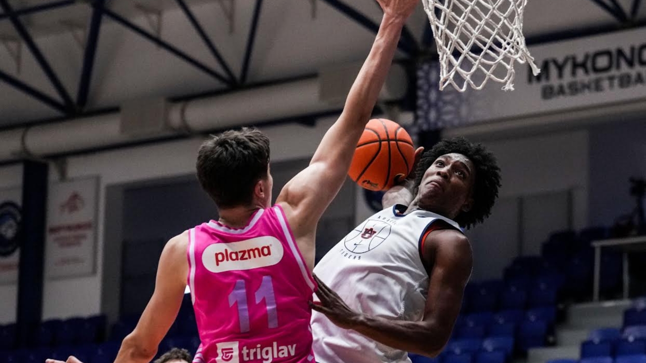 Auburn basketball player attacking the rim during an exhibition game in Greece